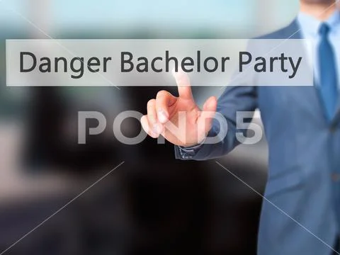 Danger Bachelor Party - Businessman hand pressing button on touc Stock Photos