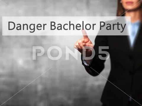 Danger Bachelor Party - Businesswoman hand pressing button on to Stock Photos