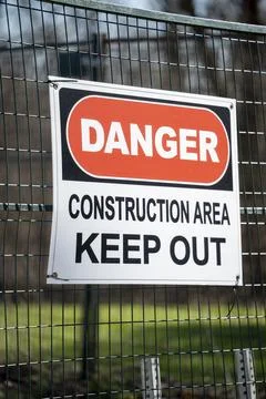 Danger Construction Area Keep Out Warning Sign on Fence 스톡 사진