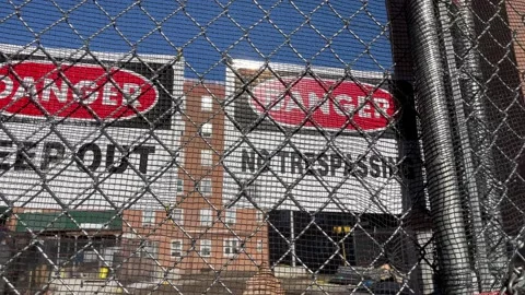 Danger construction at public housing Stock Footage 168539382