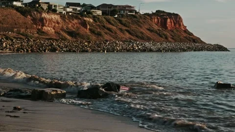 "Danger: Construction Site" Sign on Beach at Sunset Adelaide 4K 24fps Stock Footage 303731553