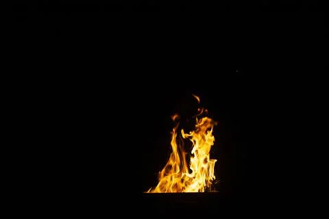 Danger fire on a dark background. Background from fire. Fire pattern can be u 스톡 사진