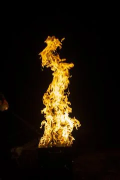 Danger fire on a dark background. Background from fire. Fire pattern can be u 스톡 사진