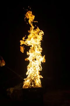 Danger fire on a dark background. Background from fire. Fire pattern can be u 스톡 사진
