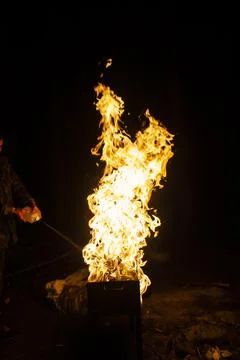 Danger fire on a dark background. Background from fire. Fire pattern can be u 스톡 사진