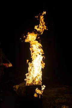 Danger fire on a dark background. Background from fire. Fire pattern can be u Stock Photos