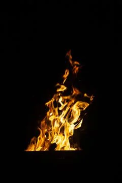 Danger fire on a dark background. Background from fire. Fire pattern can be u 스톡 사진