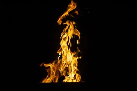 Danger fire on a dark background. Background from fire. Fire pattern can be u 스톡 사진