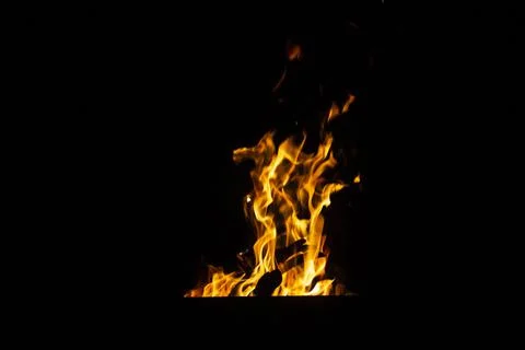 Danger fire on a dark background. Background from fire. Fire pattern can be u 스톡 사진