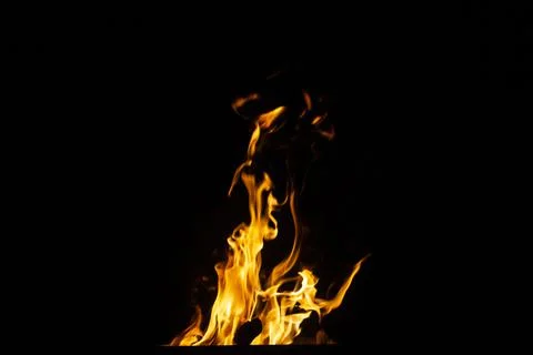 Danger fire on a dark background. Background from fire. Fire pattern can be u 스톡 사진