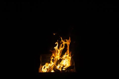 Danger fire on a dark background. Background from fire. Fire pattern can be u 스톡 사진