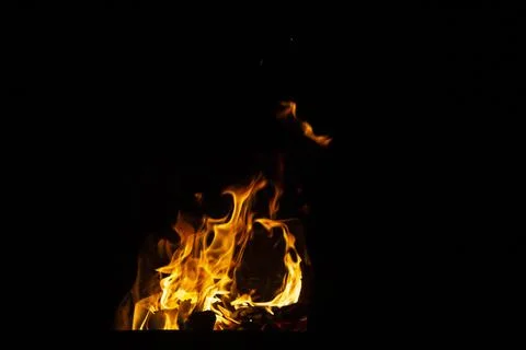 Danger fire on a dark background. Background from fire. Fire pattern can be u 스톡 사진