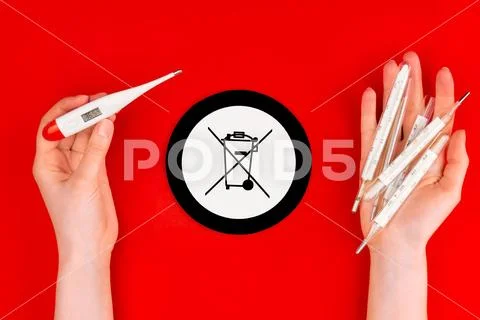 Danger glass human body mercury thermometers compare to safety electric body Stock Photos