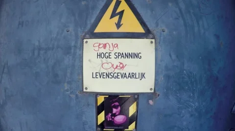 Danger high voltage sign moving away from the ISO warning symbol 4k Stock Footage 59168162