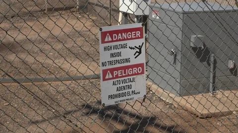 Danger high voltage sign protecting an electrical sub-station Video stock 50092552