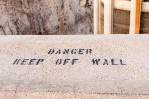 Danger, keep off wall Stock Photos