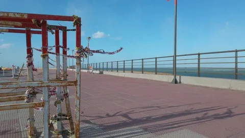 Danger ribbons stirred by the wind in rusty metal structure. Stock Footage 107169141