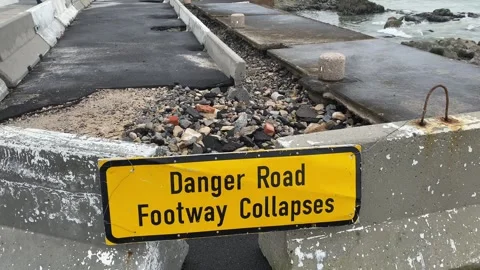 Danger Road footway collapses Stock Footage 313733033