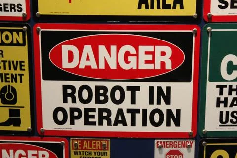 Danger robot in operation sign Stock Photos