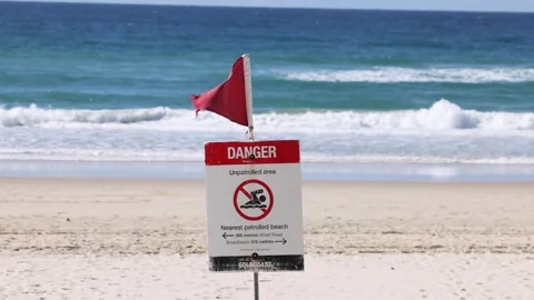 Danger Sign on Beach with Waves 库存影片 291261049