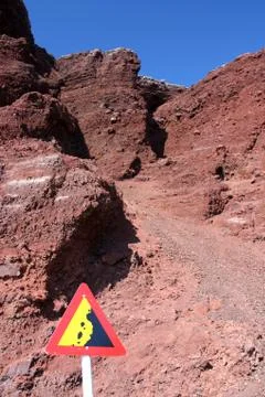 Danger sign - falling rocks Stock Photos