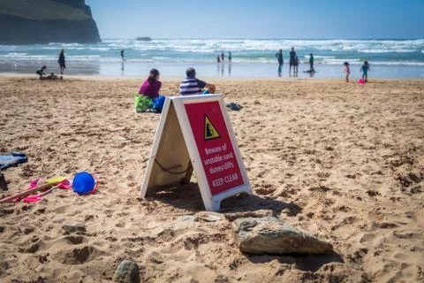Danger sign warning beach users in Cornwall, UK Stock Photos