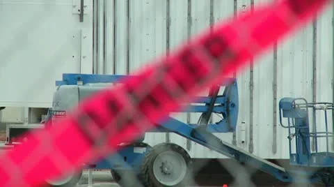 DANGER TAPE CONSTRUCTION ZONE Stock Footage 14877718