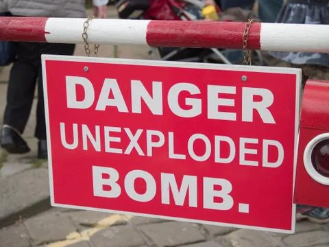 Danger unexploded bomb sign Stock Photos