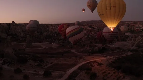 A dangerous and difficult drone span between rocks and balls in Cappadocia Stock Footage 118699853