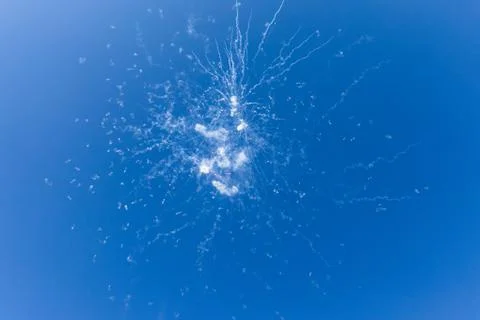 Dangerous and dramatic cloud of smoke after an explosion in the sky. Stock Photos