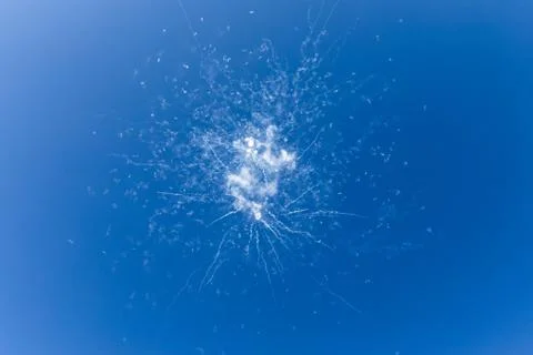 Dangerous and dramatic cloud of smoke after an explosion in the sky. Stock Photos
