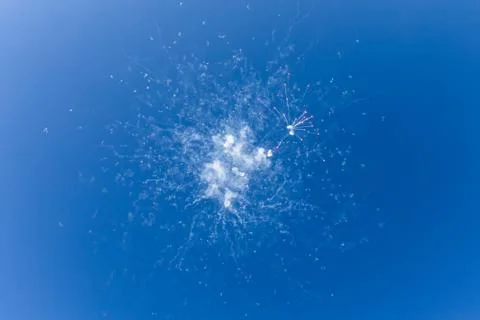 Dangerous and dramatic cloud of smoke after an explosion in the sky. Stock Photos