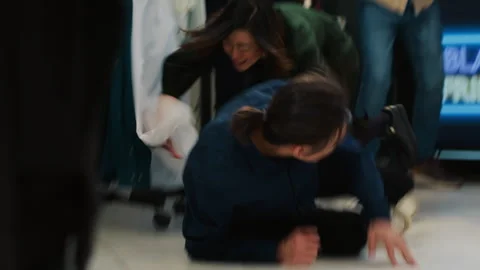 Dangerous black friday behaviour Stock Footage 246889428