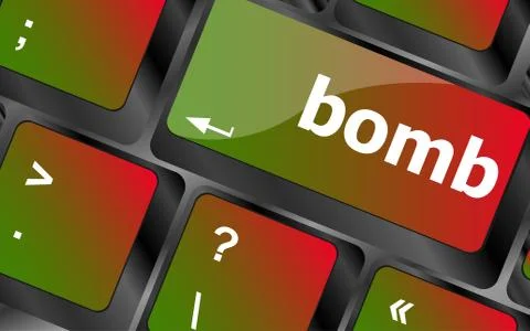 Dangerous bomb button on white computer keyboard Illustrazione stock