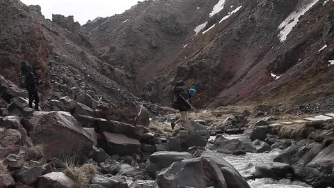 Dangerous bridge across a mountain river (caucasus) Stock Footage 83783643