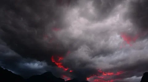 Dangerous clouds on the sky. Thunderstorm over the mountain. Swiss Alps. Stock Footage 65210632