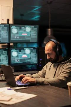 Dangerous coder hacking security system to steal big data Stock Photos