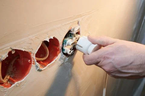 Dangerous connection of an electrical plug Stock Photos