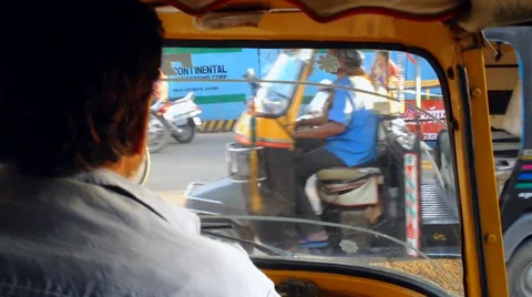 Dangerous drive in local three-wheel Tuk-tuk in Jaipur, India. Stock Footage 37514209