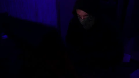 Dangerous Hooded Hacker Breaks into  Data Servers 動画素材 220082953
