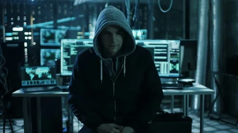 Dangerous Internationally Wanted Hacker Speaks into the Camera. Stock Footage