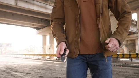 Dangerous man pulls knife, walks forward Stock Footage 118402302