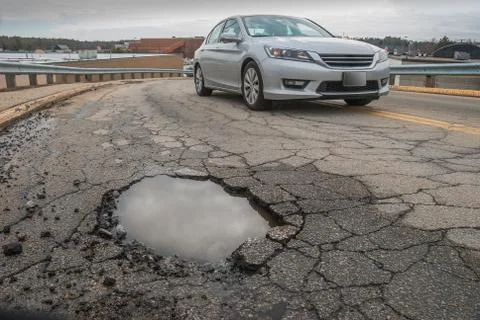 Dangerous pothole Stock Photos
