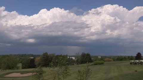 Dangerous severe thunderstorm rolling in on golf course Stock Footage