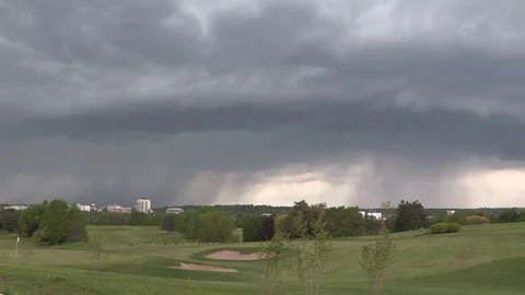 Dangerous severe thunderstorm rolling in on golf course Stock Footage