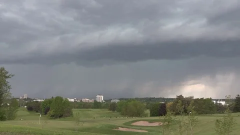 Dangerous severe thunderstorm rolling in on golf course Stock Footage