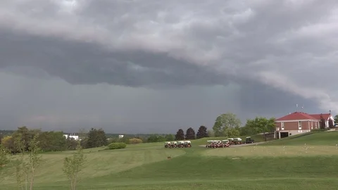 Dangerous severe thunderstorm rolling in on golf course Stock Footage
