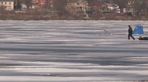 Dangerous thin unsafe ice in with people on it in Barrie Canada Stock Footage 60827690