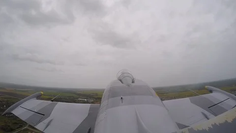 Dangerous trick. Airplane performs rotates about longitudinal axis 360 °. Top. Stock Footage 118677312