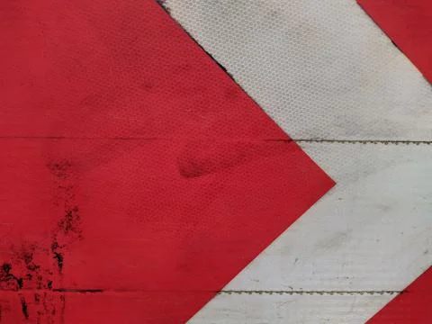Dangerous turn. Warning traffic road sign board red and white arrows. Stock Photos